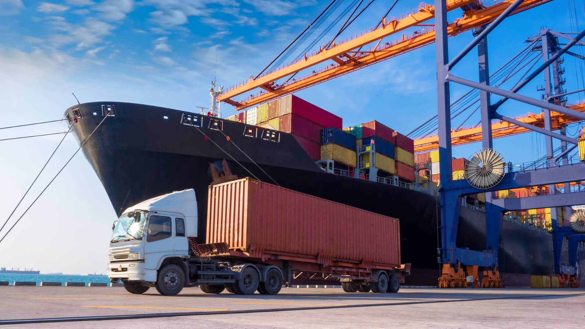 De_Rijke_Logistics_-_Transportation_truck_boat_harbor.jpg